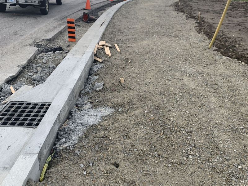 Installation of curbing at the corner of Haley Road and Parade Street.