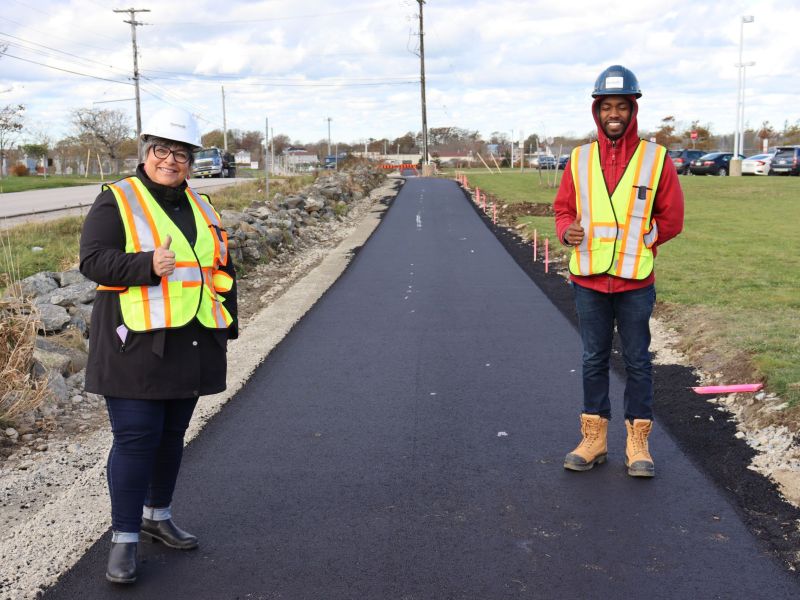 Mayor Mood and Project Engineer DeMario Dunkley inpsecting the new trail on Forest Street.